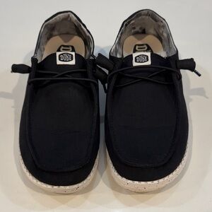 HEYDUDE Women's Wendy Basic Canvas Slip On casual shoe in black. Size 9